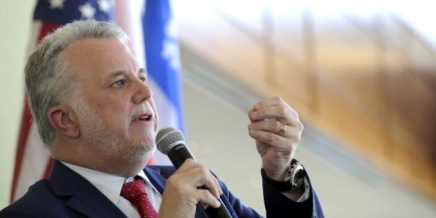 Quebec Premier Philippe Couillard answers questions after giving the keynote speech at the 23rd Annual Energy Trade & Technology Conference in Boston, Massachusetts, November 13, 2015. The two day conference hosts some of North Americaââ¬â¢s leading policy leaders, public utility executives and energy technology authorities. REUTERS/Gretchen Ertl