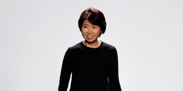 NEW YORK, NY - FEBRUARY 16: Designer Hiromi Asai greets the audience from the runway at Hiromi Asai Fall 2016 during New York Fashion Week: The Shows at The Dock, Skylight at Moynihan Station on February 16, 2016 in New York City. (Photo by Frazer Harrison/Getty Images for NYFW: The Shows)