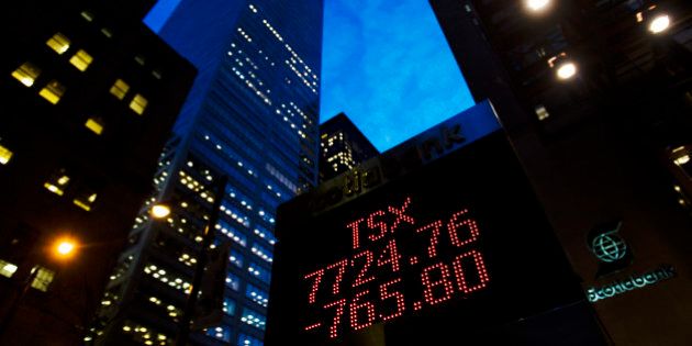 A sign displaying TSX information is seen in Toronto November 20, 2008. Toronto Stock Exchange's main index sank to its lowest level in nearly five years on Thursday afternoon as an earning warning from Toronto-Dominion Bank pressured the financials group and the price of crude slid below $50 a barrel. REUTERS/Mark Blinch (CANADA)