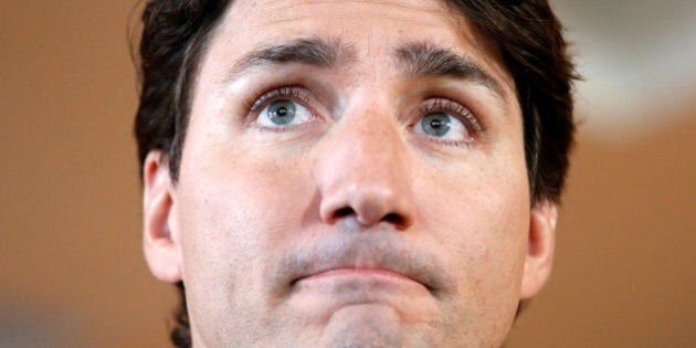 Canada's Prime Minister Justin Trudeau listens to a question from a journalist during an event at a restaurant in Gatineau, Quebec, Canada, July 20, 2016. REUTERS/Chris Wattie