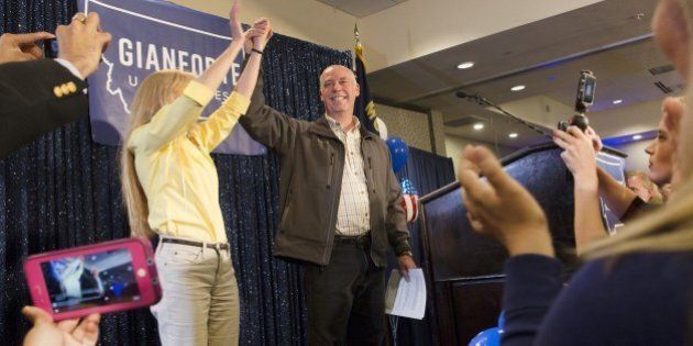 BOZEMAN, MT - MAY 25: Republican Greg Gianforte scelebrates with supporters after being declared the winner at a election night party for Montana's special House election against Democrat Rob Quist at the Hilton Garden Inn on May 25, 2017 in Bozeman, Montana. Gianforte won one day after being charged for assuulting a reporter. The House seat was left open when Montana House Representative Ryan Zinke was appointed Secretary of Interior by President Trump. (Photo by Janie Osborne/Getty Images)