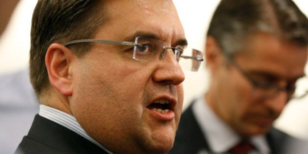 Montreal Mayor Denis Coderre speaks to reporters at a press conference following his private meeting with Major League Baseball Commissioner Rob Manfred at Major League Baseball headquarters, Thursday, May 28, 2015, in New York. Coderre is seeking to bring a baseball team back to Montreal, starting with several regular season games to be played there in 2016. (AP Photo/Kathy Willens)