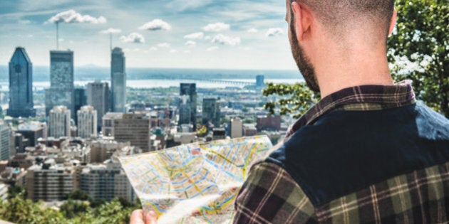 tourist reading a map in Montreal