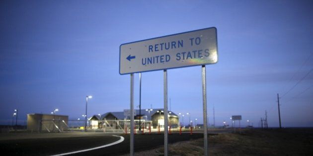 A United States border post into Canada is seen before it opens in the morning near Havre, Montana, United States, November 20, 2015. Picture taken November 20, 2015. REUTERS/Lucy Nicholson