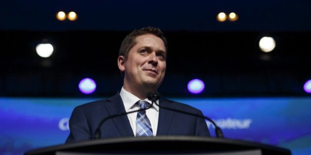 Andrew Scheer, leader of Canada's Conservative Party, smiles while speaking after being named the party's next leader during the Conservative Party Of Canada Leadership Conference in Toronto, Ontario, Canada, on Saturday, May 27, 2017. Canada's Conservative Party has settled on a stay-the-course candidate to be its next leader, electing Scheer to be Prime Minister Justin Trudeau's chief rival in a surprise multi-ballot victory. Photographer: Cole Burston/Bloomberg via Getty Images