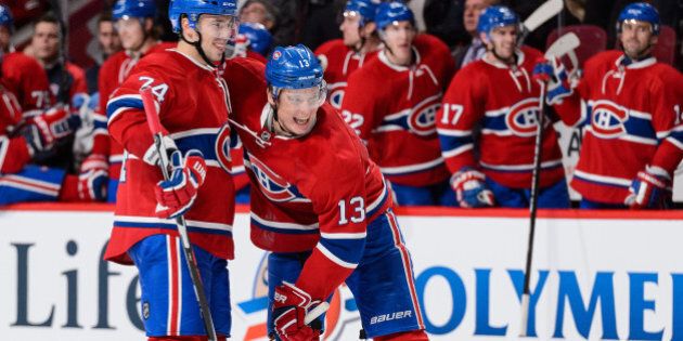 MONTREAL, QC - OCTOBER 20: Alexander Semin #13 of the Montreal Canadiens celebrates his second period goal and his first as a Canadien with teammate Alexei Emelin #74 during the NHL game against the St. Louis Blues at the Bell Centre on October 20, 2015 in Montreal, Quebec, Canada. (Photo by Minas Panagiotakis/Getty Images)