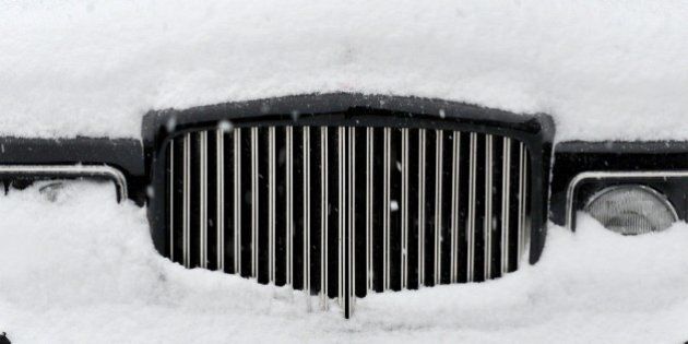 The front grill of a Bentley parked in the lot of a luxury vintage car dealership in downtown Greenwich, Connecticut March 14, 2017. Winter Storm Stella dumped snow and sleet Tuesday across the northeastern United States where thousands of flights were canceled and schools closed, but appeared less severe than initially forecast. After daybreak the National Weather Service (NWS) revised down its predicted snow accumulation, saying that the storm had moved across the coast. / AFP PHOTO / TIMOTHY A. CLARY (Photo credit should read TIMOTHY A. CLARY/AFP/Getty Images)
