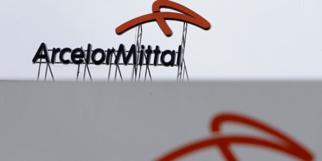 A logo is seen on the roof of the ArcelorMittal steelworks headquarters in Ostrava, Czech Republic, April 1, 2016. REUTERS/David W Cerny/File Photo