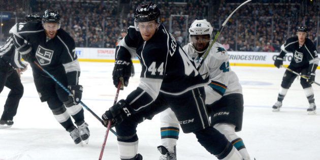 Apr 14, 2016; Los Angeles, CA, USA; Los Angeles Kings center Vincent Lecavalier (44) and San Jose Sharks right wing Joel Ward (42) chase down the puck in the second period of the game one of the first round of the 2016 Stanley Cup Playoffs at Staples Center. Mandatory Credit: Jayne Kamin-Oncea-USA TODAY Sports