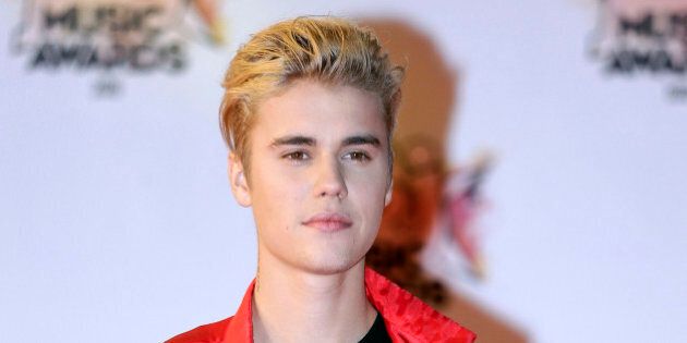 FILE - In this Nov. 7, 2015 file photo, Justin Bieber arrives at the Cannes festival palace in Cannes, southeastern France. Justin Bieber spent the day before one of his concerts in Spain playing soccer with Neymar at Barcelonas training camp. The pop singer visited the teams training center on Monday, Nov. 21, 2016 and met with the Brazilian forward and some other players of the Catalan club. (AP Photo/Lionel Cironneau, File)