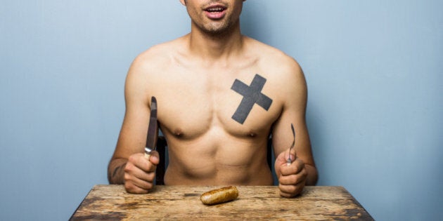 Naked man posing with his sausage