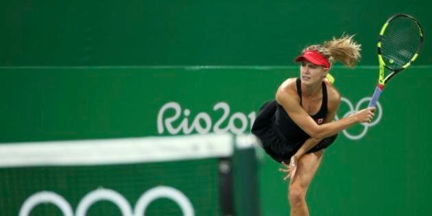 2016 Rio Olympics - Tennis - Preliminary - Women's Doubles First Round - Olympic Tennis Centre - Rio de Janeiro, Brazil - 07/08/2016. Eugenie Bouchard (CAN) of Canada in action during her match with Gabriela Dabrowski (CAN) of Canada against Klaudia Jansignacik (POL) of Poland and Paula Kania (POL) of Poland. REUTERS/Kevin Lamarque FOR EDITORIAL USE ONLY. NOT FOR SALE FOR MARKETING OR ADVERTISING CAMPAIGNS.