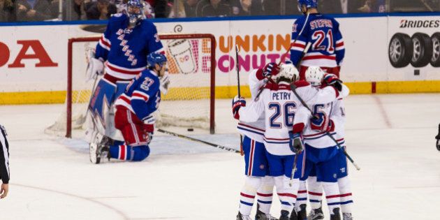 NEW YORK, NY - APRIL 16: The Canadiens celebrate after Montreal Canadiens left wing Artturi Lehkonen (62) nets the puck past New York Rangers goalie Henrik Lundqvist (30) during the second period of game 3 of the first round of the 2017 Stanley Cup Playoffs between the Montreal Canadiens and the New York Rangers on April 16, 2017, at Madison Square Garden in New York, NY. (Photo by David Hahn/Icon Sportswire via Getty Images)