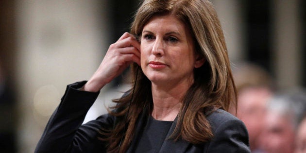 Canada's Public Works and Status of Women Minister Rona Ambrose stands to speak during Question Period in the House of Commons on Parliament Hill in Ottawa December 10, 2012. REUTERS/Chris Wattie (CANADA - Tags: POLITICS)