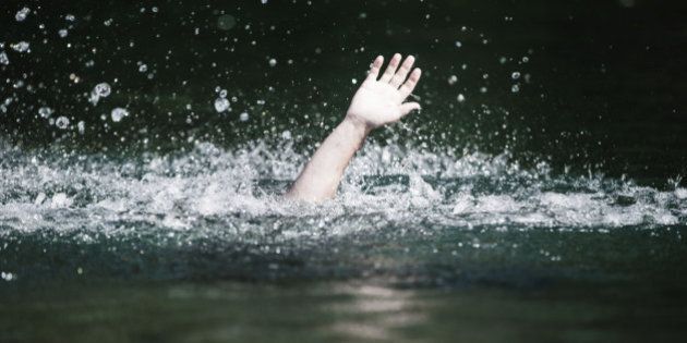 Moving Hand of Someone Drowning and in Need of Help