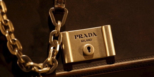 A Prada product is seen inside a display window at the financial Central district of Hong Kong, China November 10, 2015. REUTERS/Bobby Yip