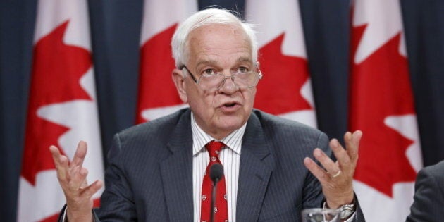 Canada's Immigration Minister John McCallum speaks during a news conference in Ottawa, Canada November 24, 2015. REUTERS/Chris Wattie