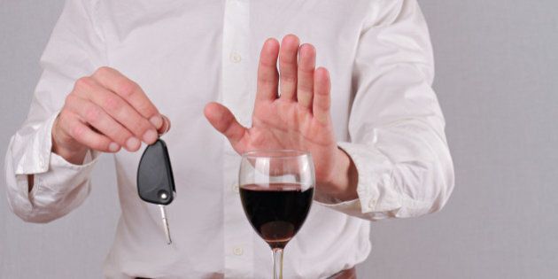 Man refuses to drink wine. Don't drink and drive concept