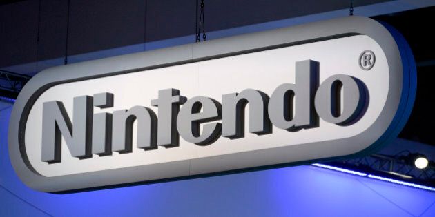 Nintendo signage is displayed at the company's booth at the 2014 Electronic Entertainment Expo, known as E3, in Los Angeles, California June 11, 2014. REUTERS/Kevork Djansezian (UNITED STATES - Tags: BUSINESS SCIENCE TECHNOLOGY LOGO)
