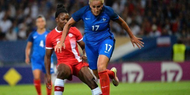France's midfielder Kheira Hamraoui (R) is tackled by Canada's midfielder Deanne Rose (L) during the women's friendly football match between France and Canada at the Abbe-Deschamp stadium in Auxerre, central-eastern France, on July 23, 2016. / AFP / ROMAIN LAFABREGUE (Photo credit should read ROMAIN LAFABREGUE/AFP/Getty Images)