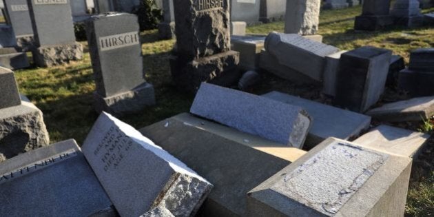 Vandalized tombstones are seen at the Jewish Mount Carmel Cemetery, February 26, 2017, in Philadelphia, PA.Police say more than 100 tombstones were vandalized a week after a Jewish cemetery in St. Louis was desecrated. / AFP / DOMINICK REUTER (Photo credit should read DOMINICK REUTER/AFP/Getty Images)