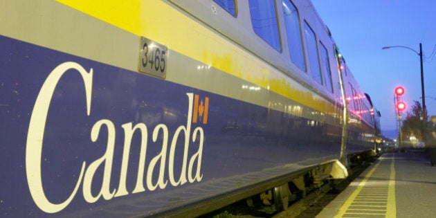 Canada, Charny, VIA Rail train station passenger car platform in the evening