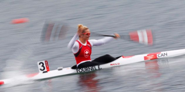 Canada's Emilie Fournel competes in the women's kayak single (K1) 500m heat at the Eton Dorney during the London 2012 Olympic Games August 7, 2012. REUTERS/Jim Young (BRITAIN - Tags: OLYMPICS SPORT CANOEING)