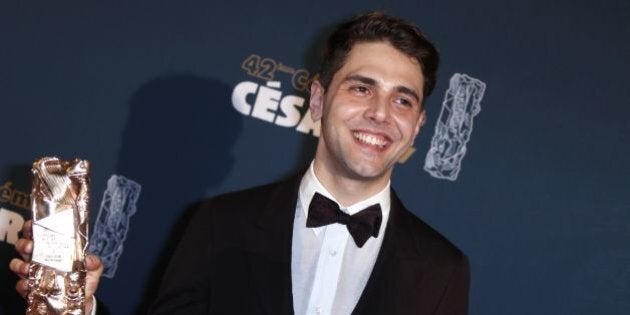 French Canadian actor and film director Xavier Dolan poses with his trophy during a photocall after winning the Best Editing award for 'Juste la fin du monde' (It's Only the End of the World) during the 42nd edition of the Cesar Ceremony at the Salle Pleyel in Paris on February 24, 2017. / AFP / THOMAS SAMSON (Photo credit should read THOMAS SAMSON/AFP/Getty Images)