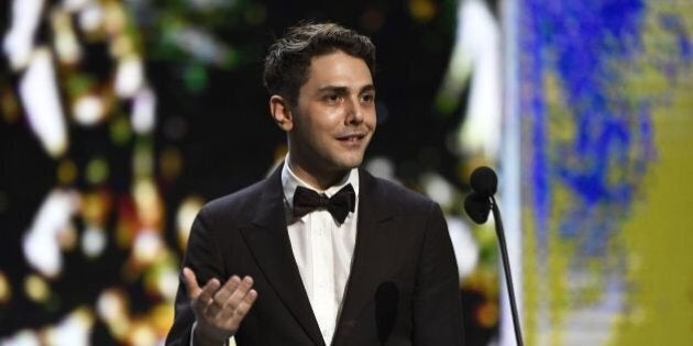 French Canadian actor and film director Xavier Dolan speaks after winning the Best Editing award for...
