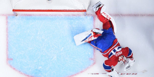 MONTREAL, QC - APRIL 20: Goaltender Carey Price #31 of the Montreal Canadiens lays on the ice after allowing a goal in overtime against the New York Rangers in Game Five of the Eastern Conference First Round during the 2017 NHL Stanley Cup Playoffs at the Bell Centre on April 20, 2017 in Montreal, Quebec, Canada. The New York Rangers defeated the Montreal Canadiens 3-2 in overtime. (Photo by Minas Panagiotakis/Getty Images)