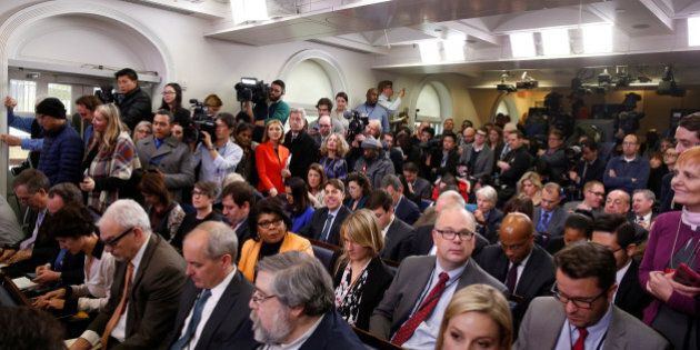 Journalists wait for U.S. President Barack Obama to start his annual year-end news conference at the White House in Washington, U.S., December 16, 2016. REUTERS/Jonathan Ernst
