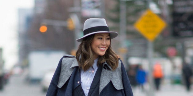 NEW YORK, NY - FEBRUARY 12: Aimee Song is wearing a coat and blazer from thisisgreat in the streets of Manhattan on February 12, 2015 in New York City. (Photo by Timur Emek/Getty Images)