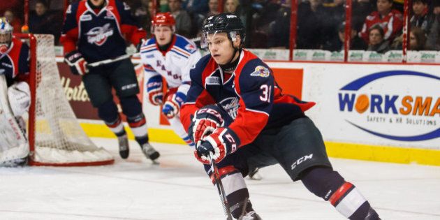 WINDSOR, ON - MARCH 30: Defenceman Mikhail Sergachev #31 of the Windsor Spitfires moves the puck against the Kitchener Rangers during game 4 of the Western Conference quarter-final series on March 30, 2016 at the WFCU Centre in Windsor, Ontario, Canada. (Photo by Dennis Pajot/Getty Images)