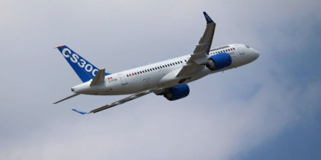 A Bombardier CS300 C Series aircraft, manufactured by Bombardier Inc., performs a flying display on day two of the 51st International Paris Air Show in Paris, France, on Tuesday, June 16, 2015. The 51st International Paris Air Show is the world's largest aviation and space industry exhibition and takes place at Le Bourget airport June 15 - 21. Photographer: Jasper Juinen/Bloomberg via Getty Images