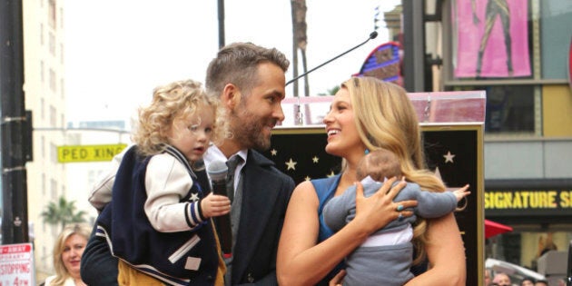 Ryan Reynolds, Blake Lively and their two children attend a ceremony honoring Ryan Reynolds with a star on the Hollywood Walk of Fame on Thursday, Dec. 15, 2016, in Los Angeles. (Photo by Eric Charbonneau/Invision for Twentieth Century Fox/AP Images)