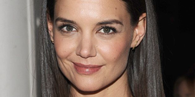 NEW YORK, NY - FEBRUARY 12: Katie Holmes attends the Marchesa Show during Mercedes-Benz Fashion Week Fall 2014 at New York Public Library - Celeste Bartos Forum on February 12, 2014 in New York City. (Photo by Gary Gershoff/WireImage)