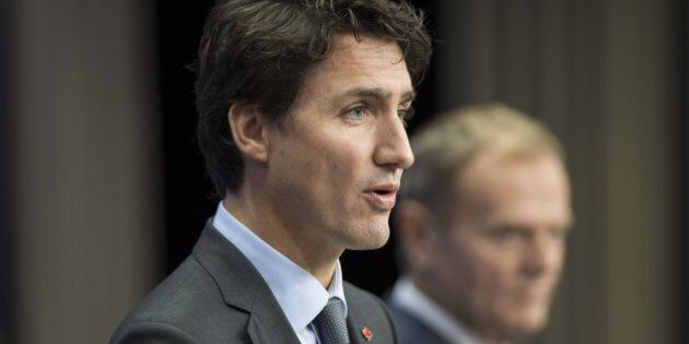 Justin Trudeau, Canada's prime minister, speaks during a news conference after signing the Comprehensive Economic and Trade Agreement (CETA) in Brussels, Belgium, on Sunday, Oct. 30, 2016. The agreement, which has been on the negotiation table since 2009, will cut tariffs for EU manufacturers by 500 million euros ($549 million) a year and facilitate trade between the two markets. Photographer: Jasper Juinen/Bloomberg via Getty Images