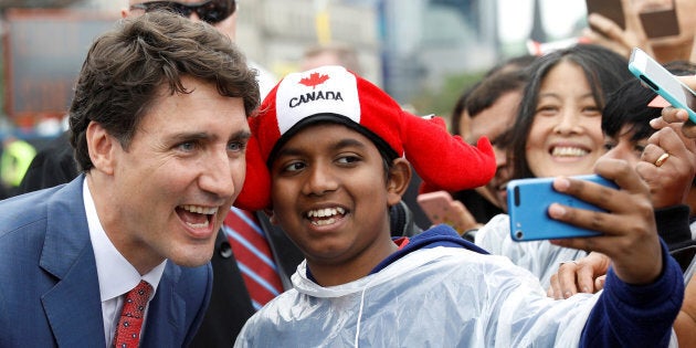 Canada's Prime Minister Justin Trudeau poses for a selfie during Canada Day celebrations as the country marks its 150th anniversary since confederation, on Parliament Hill in Ottawa, Canada July 1, 2017. REUTERS/Blair Gable TPX IMAGES OF THE DAY