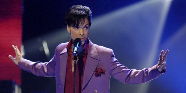 Singer Prince performs in a surprise appearance on the