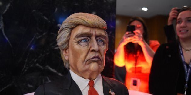 A cake in the likeness of Republican presidential nominee Donald Trump is on display at his election night event at the New York Hilton Midtown in New York on November 8, 2016. Millions of Americans turned out Tuesday to decide whether to send Democrat Hillary Clinton to the White House as their first woman president or to put their trust in Republican maverick populist Donald Trump. / AFP / Timothy A. CLARY (Photo credit should read TIMOTHY A. CLARY/AFP/Getty Images)
