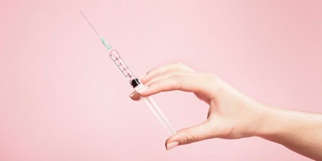 hand, holding, syringe, background, studio, plain, pink, finger, fingers, needle