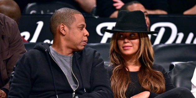 NEW YORK, NY - JANUARY 12: Jay-Z and Beyonce Knowles attend the Houston Rockets vs Brooklyn Nets game...