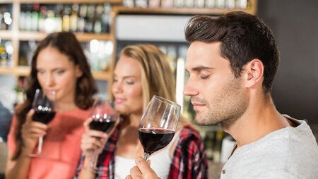 53794683 - friends smelling wine at bar