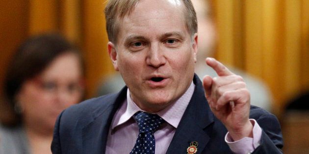 New Democratic Party MP Peter Julian speaks during Question Period in the House of Commons on Parliament Hill in Ottawa February 16, 2012. REUTERS/Chris Wattie (CANADA - Tags: POLITICS)