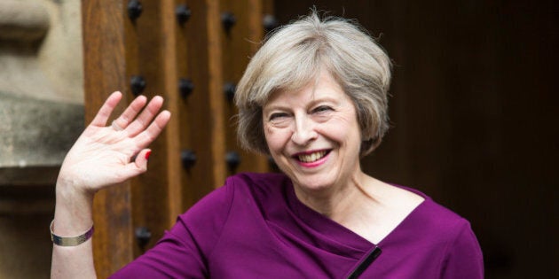 LONDON, ENGLAND - JULY 07: British Home Secretary and Conservative leadership contender Theresa May waves outside the Houses of Parliament on July 7, 2016 in London, England. Theresa May has the backing of 199 fellow MPs after the second ballot for the leadership of the Conservative Party. Receiving 84 votes, Andrea Leadsom MP joins May on the shortlist presented to the Conservative Party members and Michael Gove was eliminated with 46 votes. (Photo by Jack Taylor/Getty Images)