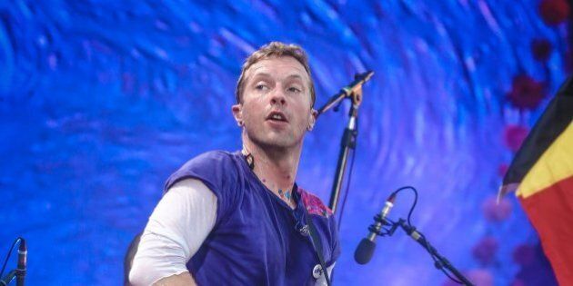 BRUSSELS , BELGIUM - JUNE 21, 2017:Chris Martin pictured performing on stage during the Coldplay concert on June 21, 2017 in Brussels.(Picture by Pieter-Jan Vanstockstraeten/Photonews via Getty Images)