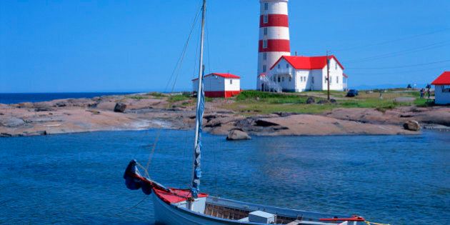 Sailboat & Pointe-des-Monts Lighthouse, Cote-Nord