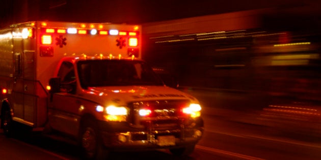 Ambulance at night, speeding