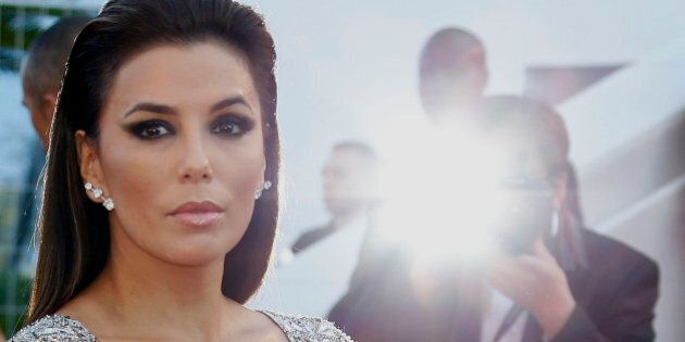 Actress Eva Longoria poses on the red carpet as she arrives for the screening of the animated film