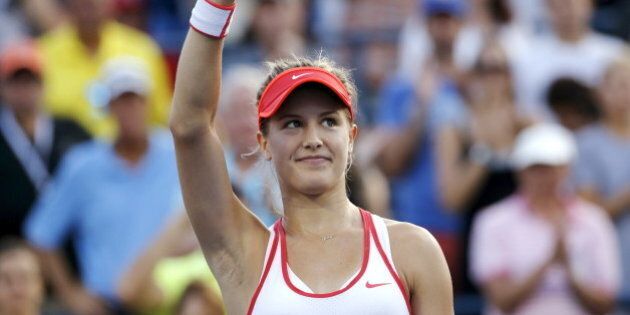 Eugenie Bouchard of Canada waves to the crowd after defeating Dominika Cibulkova of Slovakia in their women's singles third round match at the U.S. Open Championships tennis tournament in New York, September 4, 2015. REUTERS/Mike Segar